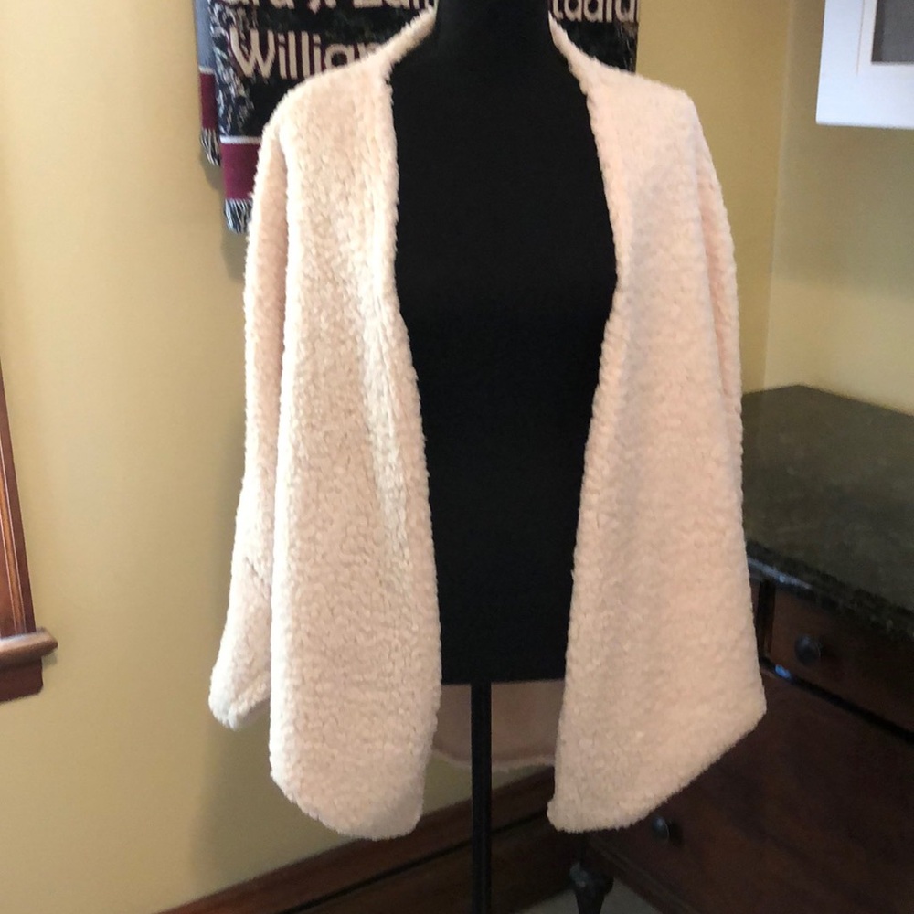 Sherpa jacket made with a sleeve but it looks like a cape style Ptp 38”